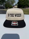 “In the weeds” cap