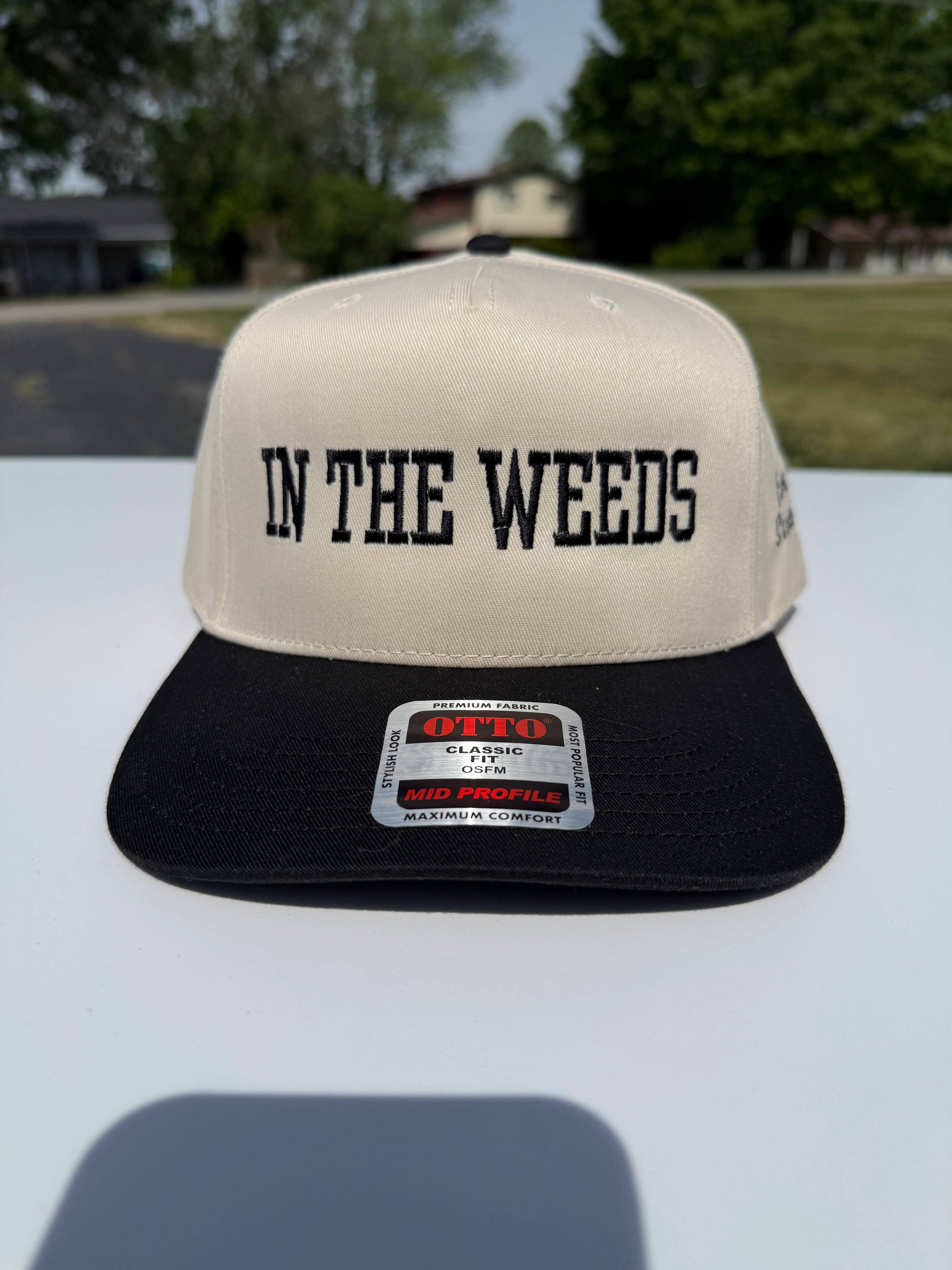 “In the weeds” cap